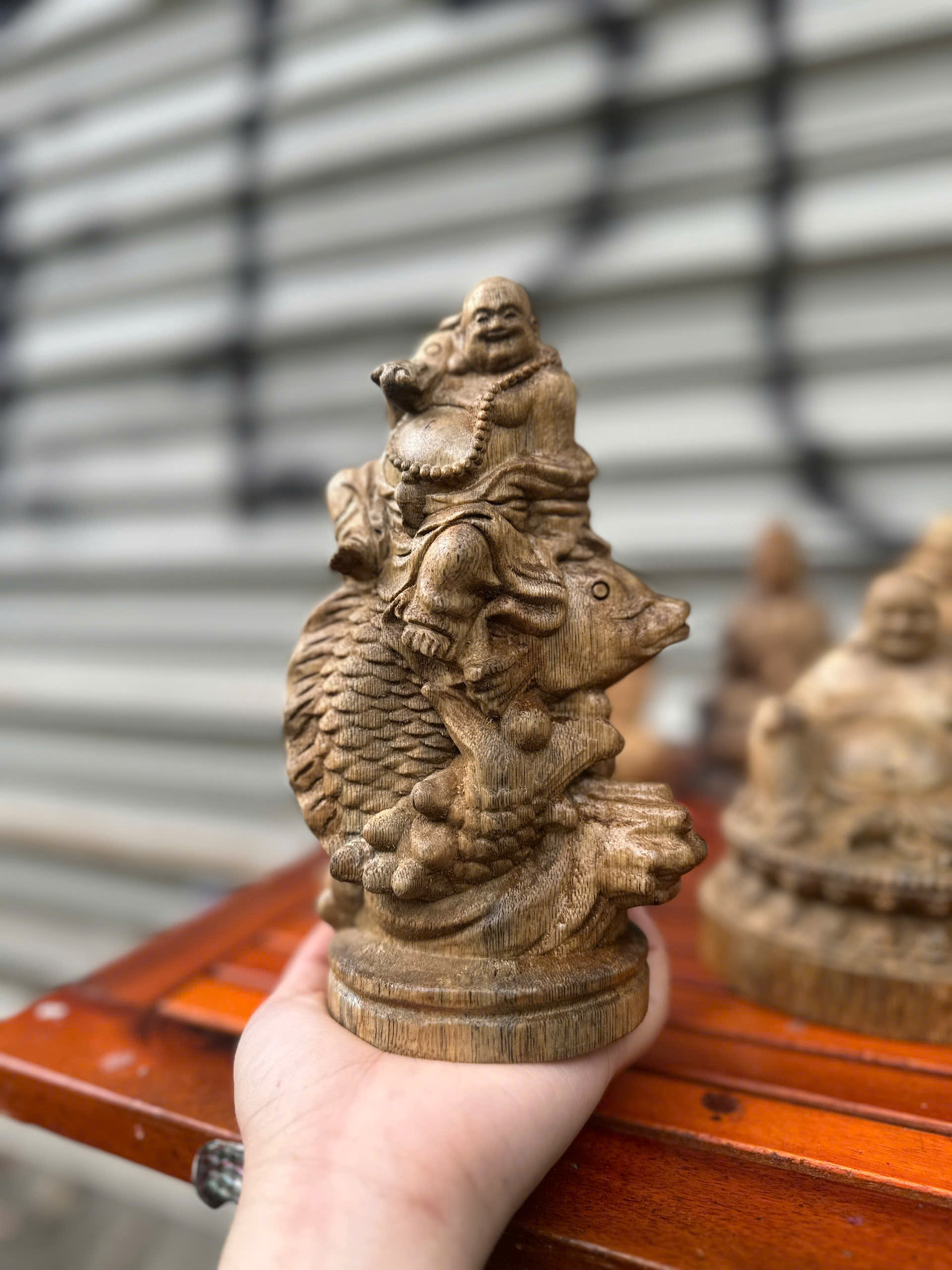 Tượng Phật Di lặc cưỡi cá chép trầm Hương